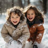 Playful siblings having fun in the snow photo