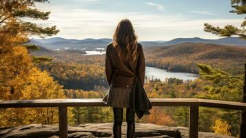 Woman taking in the view at scenic overlook photo