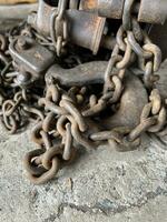 old rusty chains in the garage photo