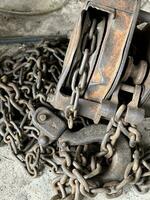 old rusty chains in the garage photo