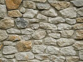 close up stone wall texture background photo