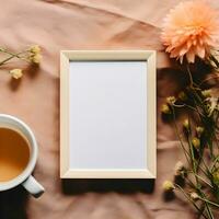 Flat Lay Top View Plain White Portrait Poster Art Mockup with Flower Decorations and Cup of Tea, ai generated photo