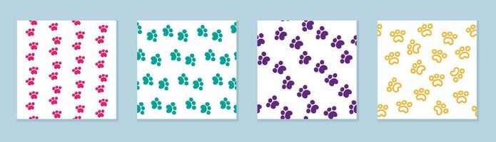 Set of four seamless multicolored cat paw patterns vector