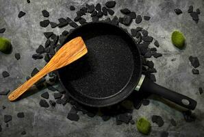 Restaurant background black pan coal green moss wooden spatula kitchen wallpaper photo