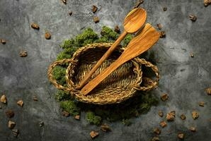 Wooden basket spoon spatula moss stacks cooking background kitchen wallpaper photo