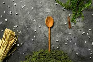 Wooden spoon moss green plant yellow corn kitchen background photo
