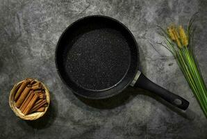 Chef cook background cinnamon corn plant black pan kitchen wallpaper photo