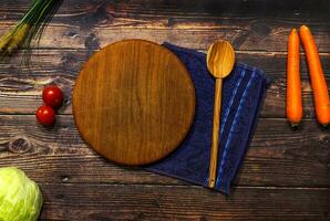 Kitchen wallpaper salad carrots tomato wood board spoon blue cloth restaurant background photo