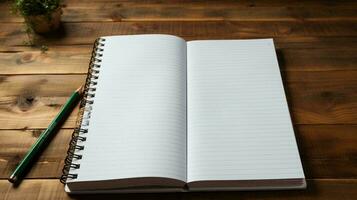 Blank notepad and pen lie on a wooden table, flat lay photo