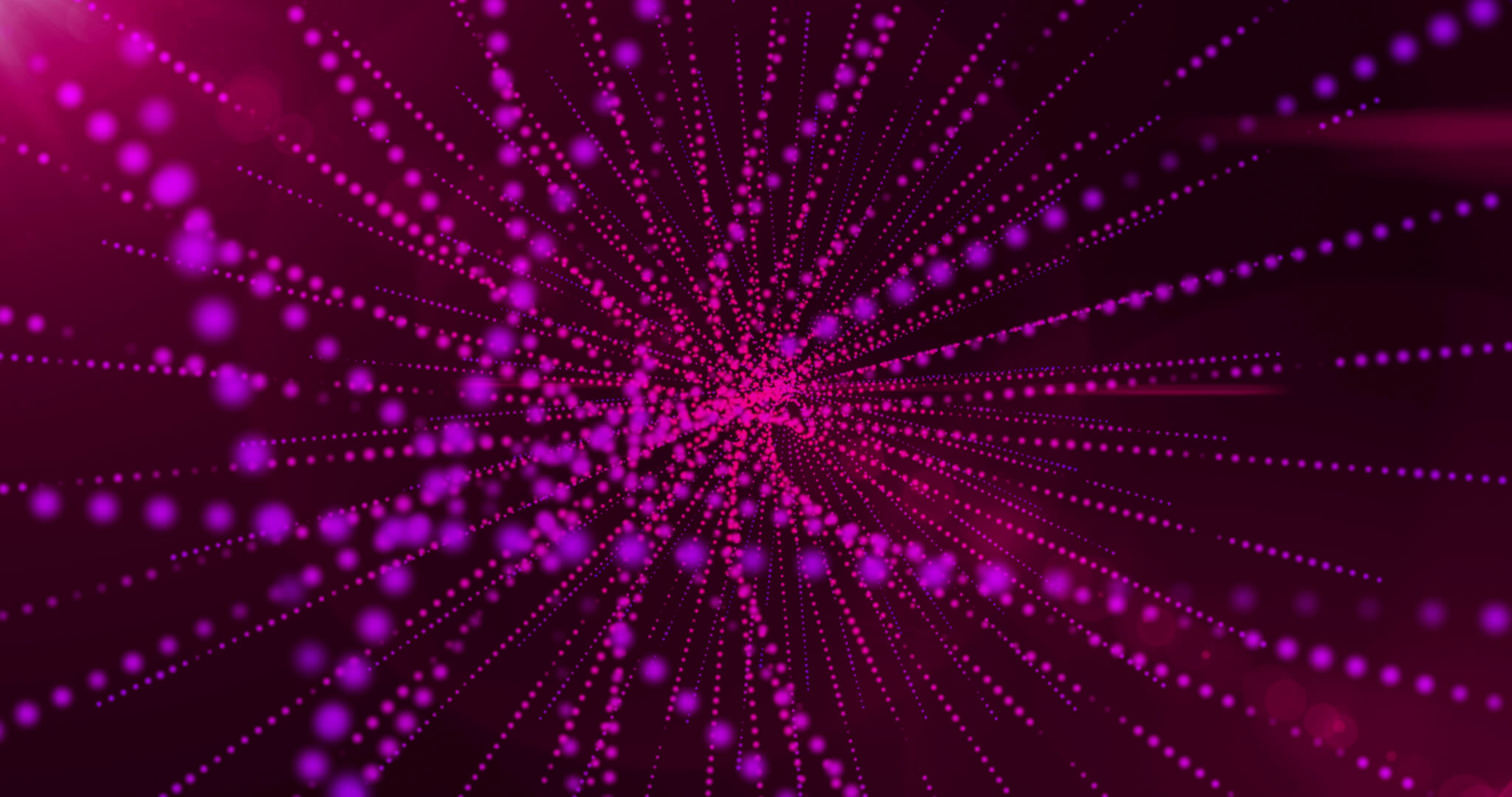 Abstract background of shimmering and sparkling glowing pink particles ...