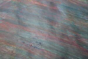 Darkish abstract paint background, mixed paint background photo