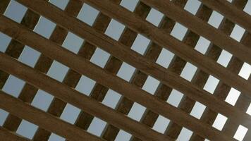 View to sky and sunshine through wooden net shed video