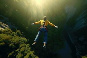 un hombre en un amarillo chaqueta y pantalones es saltando desde un acantilado dentro el abismo, extremo bungee saltando en el montaña, parte superior vista, No visible caras, ai generado foto