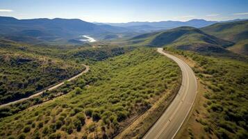 Mountain road. Landscape with rocks, sunny sky with clouds and beautiful asphalt road in the evening in summer. Highway in mountains, Generative AI illustration photo