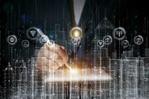 Use tablet, Smart city with technology network connecting. Internet of things and social media connection. Technology 5G and digital data connection. Future background concept. photo
