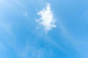 Beautiful blue sky with strange shape of clouds in the morning or evening taken at the sea for natural background or texture photo