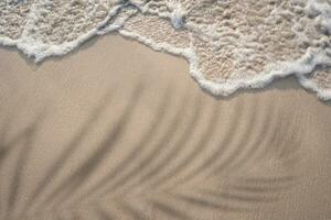 Soft ocean wave on tropical sandy beach in summer photo