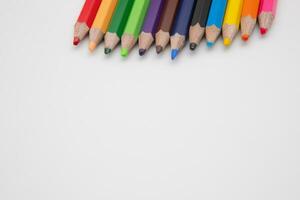 pack of 12  mini colored bunch wood  pencils isolated on a white background with  copy space photo