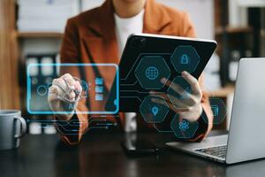 Woman using chatbot in computer and tablet  smart intelligence Ai.Chat with AI Artificial Intelligence, developed by OpenAI generate. Futuristic technology, robot in online system. photo
