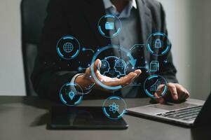 Man using chatbot in computer and tablet  smart intelligence Ai.Chat with AI Artificial Intelligence, developed by OpenAI generate. Futuristic technology, robot in online system. photo