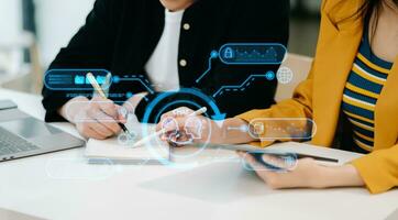 Man and Woman using chatbot in computer and tablet  smart intelligence Ai.Chat with AI Artificial Intelligence, developed by OpenAI generate. Futuristic technology, robot in online system. photo