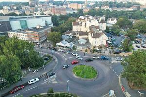 Aerial View of British Tourist Attraction of Bournemouth Beach and Sea view City of England Great Britain UK. Image Captured with Drone's Camera on September 9th, 2023 During Sunset photo