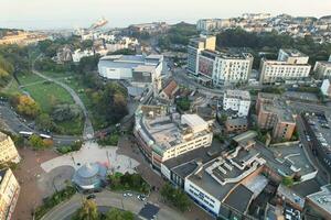 Aerial View of British Tourist Attraction of Bournemouth Beach and Sea view City of England Great Britain UK. Image Captured with Drone's Camera on September 9th, 2023 During Sunset photo