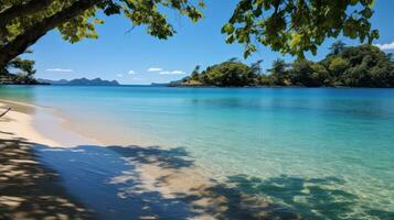 Private beach with crystal clear blue water photo