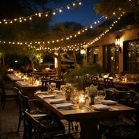 Outdoor dining under twinkling starry sky photo