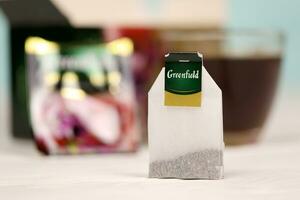 KHARKOV, UKRAINE - DECEMBER 8, 2020 Greenfield Spring Melody tea bags. Greenfield manufactured by Orimi Trade and Greenfield Tea ltd. photo