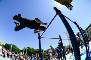 KHARKIV, UKRAINE - 27 MAY, 2018 Street workout show during the annual festival of street cultures photo