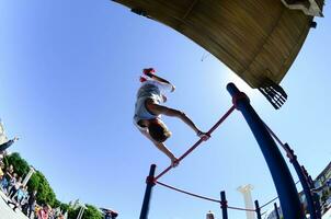 KHARKIV, UKRAINE - 27 MAY, 2018 Street workout show during the annual festival of street cultures photo