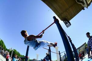 KHARKIV, UKRAINE - 27 MAY, 2018 Street workout show during the annual festival of street cultures photo