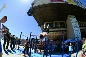 KHARKIV, UKRAINE - 27 MAY, 2018 Street workout show during the annual festival of street cultures photo