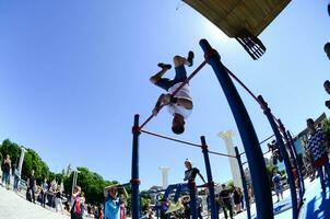 KHARKIV, UKRAINE - 27 MAY, 2018 Street workout show during the annual festival of street cultures photo