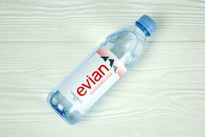 KHARKOV, UKRAINE - JULY 2, 2021 Bottle Of Evian Natural Mineral Water. Evian bottling factory located in Amphion, France photo