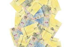 1 Ukrainian hryvnia bills flying down isolated on white. Many banknotes falling with white copyspace on left and right side photo