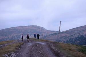 CARPATHIAN MOUNTAINS, UKRAINE - OCTOBER 8, 2022 Mount Dragobrat. Carpathians in Ukraine in foggy day photo