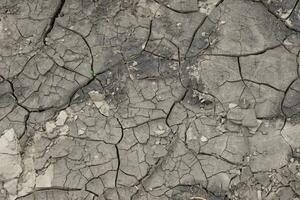 The ground has cracks in the top view for background photo
