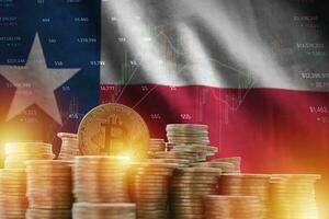 Texas US state flag and big amount of golden bitcoin coins and trading platform chart. Crypto currency photo