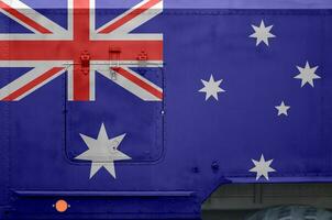 Australia flag depicted on side part of military armored truck closeup. Army forces conceptual background photo