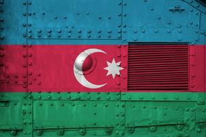 Azerbaijan flag depicted on side part of military armored tank closeup. Army forces conceptual background photo