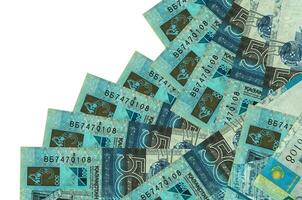 500 Kazakhstani tenge bills lies in different order isolated on white. Local banking or money making concept photo