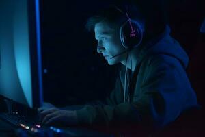 professional gamer playing tournaments online games computer with headphones, red and blue. Neural network AI generated photo