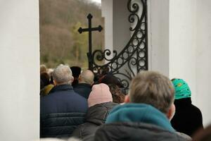 TERNOPIL, UKRAINE - APRIL 2, 2023 Many people during mission in complex of Ukrainian Jerusalem in the Mari spiritual center of Zarvanytsia In the Terebovlya district of the Ternopil photo