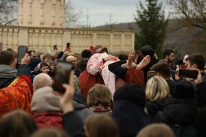 TERNOPIL, UKRAINE - APRIL 2, 2023 Many people during mission in complex of Ukrainian Jerusalem in the Mari spiritual center of Zarvanytsia In the Terebovlya district of the Ternopil photo
