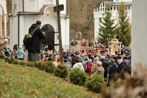 TERNOPIL, UKRAINE - APRIL 2, 2023 Many people during mission in complex of Ukrainian Jerusalem in the Mari spiritual center of Zarvanytsia In the Terebovlya district of the Ternopil photo