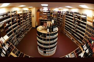 Wine store. Department of alcohol in the supermarket. Elite strong drinks. Neural network AI generated photo