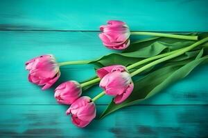 marco de tulipanes en turquesa rústico de madera antecedentes. primavera flores neural red ai generado foto