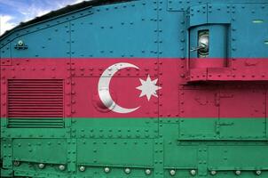 Azerbaijan flag depicted on side part of military armored tank closeup. Army forces conceptual background photo